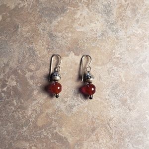 Earrings. Silvery amber color bead. Hand made.